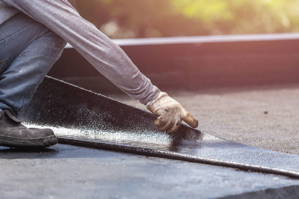 Professional Exterior Waterproofing technician working in Newton, KS